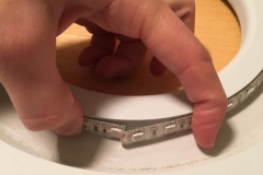 LED strip inside the groove around the hole